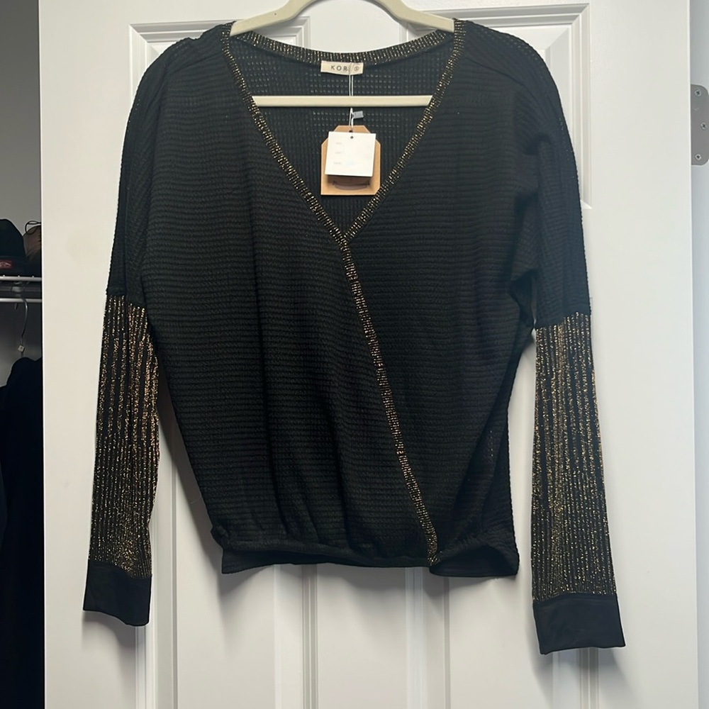 BRAND NEW W/TAGS SIZE S Long Sleeve purchased from local boutique.